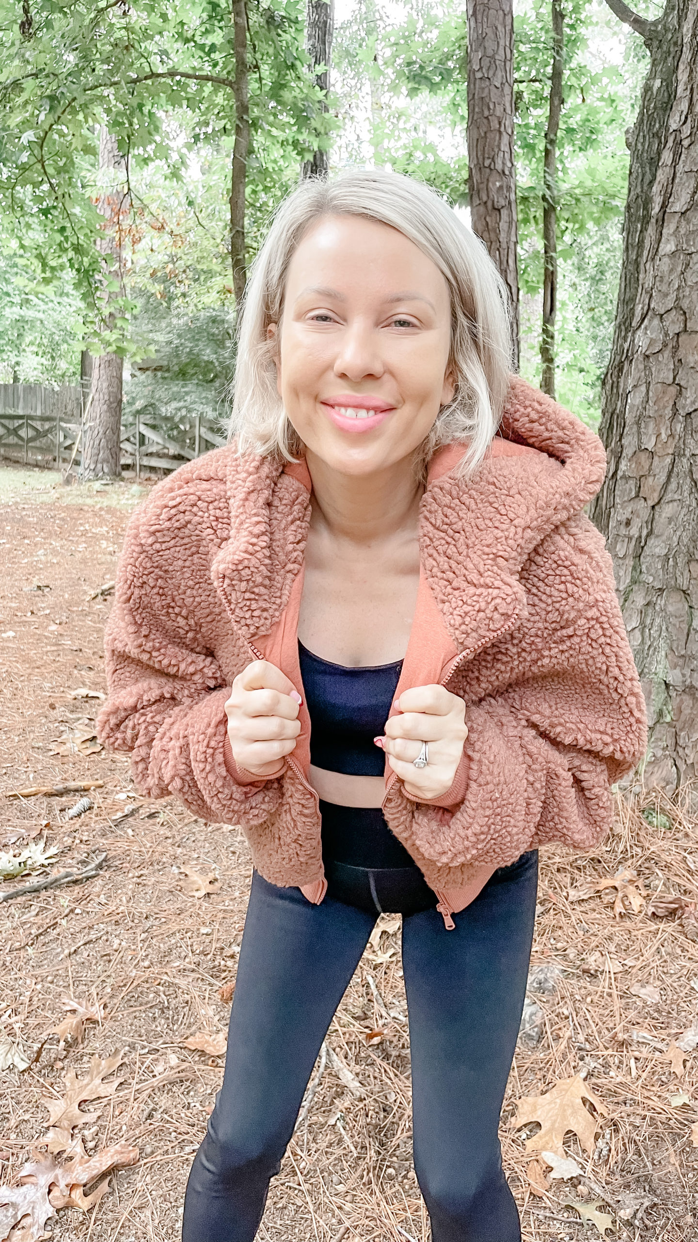 woman in exercise outfit and jacket for a healthy life