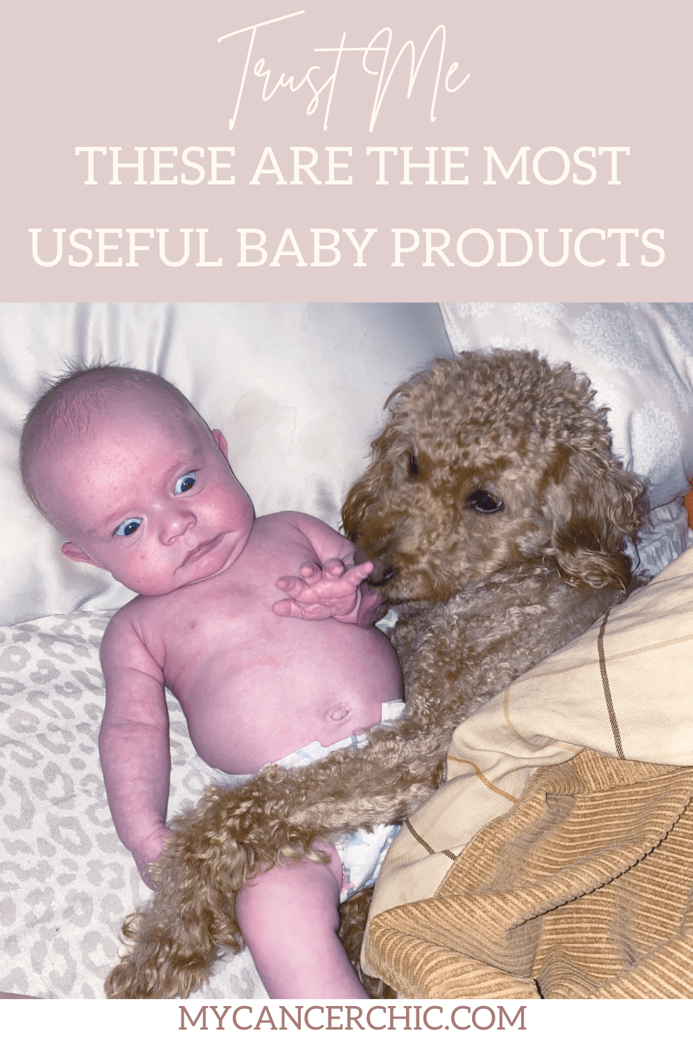 newborn and goldendoodle in bed_must have baby items you actually need