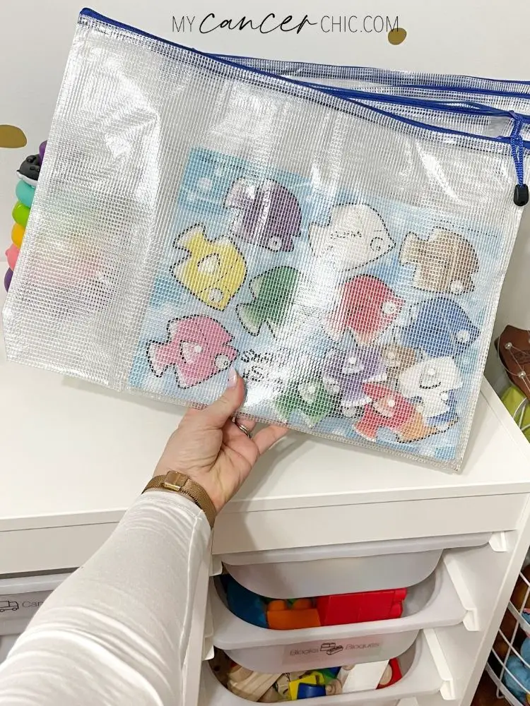 playroom organization - mesh zip bags for puzzles