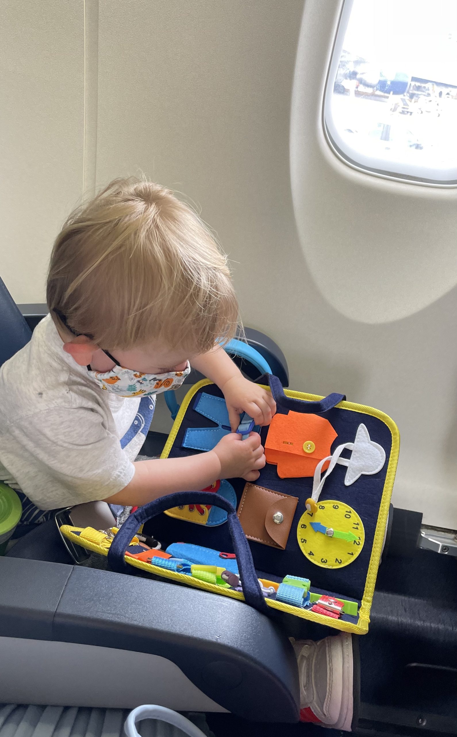 traveling with a toddler on a plane - activity board
