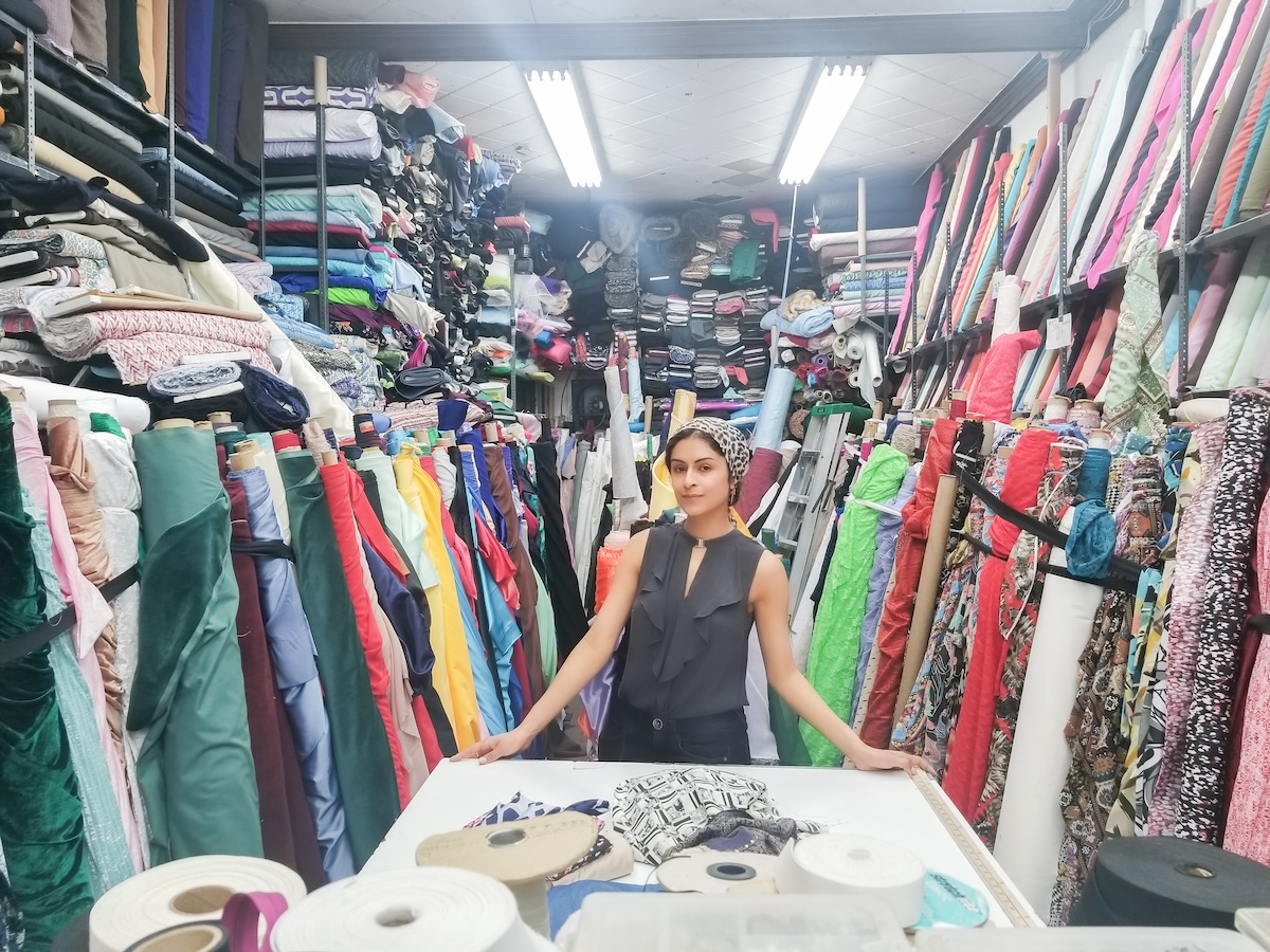 My Cancer Chic Blogger Anna Crollman shares restoring body image after breast cancer - in photo: woman surrounded by textiles